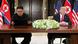 U.S. President Donald Trump speaks while North Korea's leader Kim Jong Un looks at the signed document that acknowledge the progress of the talks and pledge to keep momentum going U.S. President Donald Trump speaks while North Korea's leader Kim Jong Un looks at the signed document that acknowledge the progress of the talks and pledge to keep momentum going