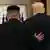 US President Donald Trump and North Korean leader Kim Jong Un leave after signing documents during their summit in Singapore June 12, 2018.