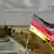 A German flag flies on a tank in Afghanistan
