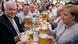 Merkel drinks a beer in Bavaria Merkel drinks a beer in Bavaria