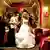 Filmszene aus "Weitertanzen" - Frau in Hochzeitskleidung inmitten von Gästen (Festival)