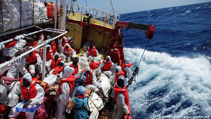 Rescued migrants on board a Sea-Eye boat