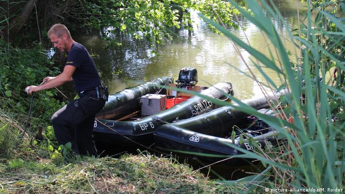 Police from Nuremberg search the river Pegnitz for the missing hitchhiker