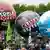 Protesters carry very large balloons with pro-environment slogans on them during an anti-coal demonstration in Berlin.