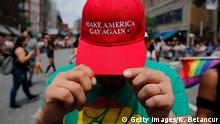 NEW YORK, NY - JUNE 24: A reveller shows off his hat mirroring President Trump's campaign slogan Make America Great Again at the annual Pride Parade on June 24, 2018 in New York City. The first gay pride parade in the U.S. was held in Central Park on June 28, 1970. (Photo by Kena Betancur/Getty Images)