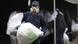 A Peruvian city employee carries a bag of seized cocaine A Peruvian city employee carries a bag of seized cocaine