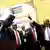 South Sudanese leaders dance to celebrate the peace deal