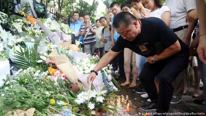 Gedenken an ermordete Schulkinder in Shanghai (picture alliance/Imaginechina/dpa/Bai Kelin)