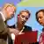 AfD members Alexander Gauland, Alice Weidel and Beatrix von Storch look at a folder