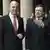 Jose Manuel Barroso pokazuje na švedskog premijera Fredrika Reinfeldta.