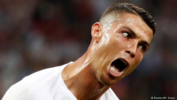 In 2018, Portugal's football star Cristiano Ronaldo reacts during a game, pulling his face into a contortion of anger