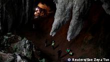 Rescue workers are seen in Tham Luang caves during a search for 12 members of an under-16 soccer team and their coach, in the northern province of Chiang Rai, Thailand, June 27, 2018. REUTERS/Soe Zeya Tun TPX IMAGES OF THE DAY