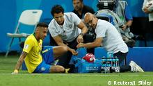 Soccer Football - World Cup - Quarter Final - Brazil vs Belgium - Kazan Arena, Kazan, Russia - July 6, 2018 Brazil's Neymar receives medical attention REUTERS/John Sibley