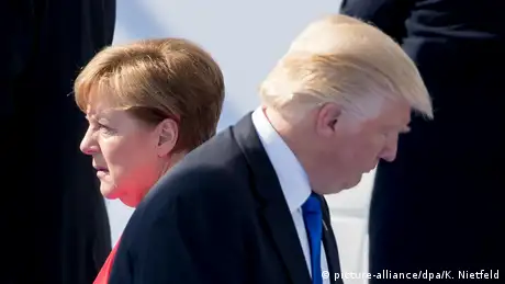 US President Donald Trump passes German Chancellor Angela Merkel