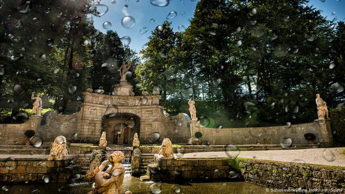 A view of Sternweiher fountain with water droplets on the lens.