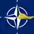 Cartoon showing blonde hair on NATO symbol