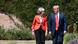 Donald Trump and Theresa May walk together to their joint press conference on the grounds of Chequers Donald Trump and Theresa May walk together to their joint press conference on the grounds of Chequers