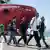 Migrants leaving the Vos Prudence ship from Doctors Without Borders