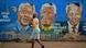 Residents walks past murals of late South African former president Nelson Mandela in Soweto, near Johannesburg Residents walks past murals of late South African former president Nelson Mandela in Soweto, near Johannesburg