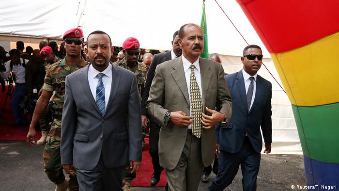 Abiy and Isaias walk together in Addis Ababa 