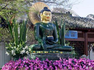A large jade Buddha after being unveiled outside the Chinese Gardens, Darling Harbor in Sydney, Australia.