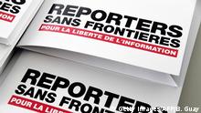 Press releases are pictured on April 25, 2018 in Paris during a press conference of Reporters Without Borders (RSF) to present the its World Press Freedom Index for 2018. - Press freedom around the world in under threat from a triple whammy of US President and Russia and China's bid to crush all dissent, says the report. The group accused the world's three superpowers -- the US, China and Russia -- of leading the charge against press freedom, with US President regularly launching personal attacks on reporters and Beijing exporting its media control model to strangle dissent elsewhere in Asia. (Photo by BERTRAND GUAY / AFP) (Photo credit should read BERTRAND GUAY/AFP/Getty Images)