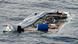 The wreckage of a migrant boat from which one woman and two bodies were recovered by Spanish NGO Proactiva Open Arms on July 17, 2018 The wreckage of a migrant boat from which one woman and two bodies were recovered by Spanish NGO Proactiva Open Arms on July 17, 2018