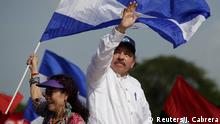 Nicaragua's President Daniel Ortega and Vice President Rosario Murillo arrive for an event to mark the 39th anniversary of the Sandinista victory over President Somoza in Managua, Nicaragua July 19, 2018. REUTERS/Jorge Cabrera