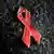 Crvena traka, simbl borbe protiv HIV/side. Svetski dan te borbe je prvi decembar