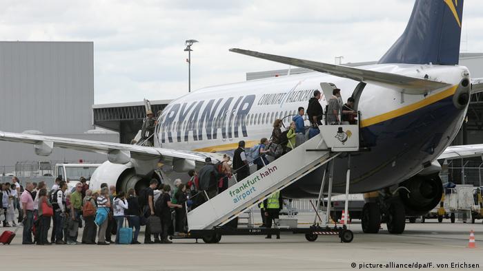 Passengers boarding a Ryanair plane 