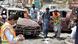 Members of the bomb disposal unit survey the site after a suicide blast, in Quetta, Pakistan Members of the bomb disposal unit survey the site after a suicide blast, in Quetta, Pakistan
