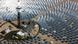 A massive solar power station in the Mojave desert in California. A massive solar power station in the Mojave desert in California.
