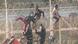 African migrants seen climbing the border between Morocco and Spain's North African enclave of Ceuta African migrants seen climbing the border between Morocco and Spain's North African enclave of Ceuta