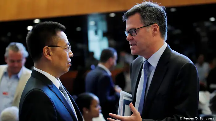 WTO-Generalratssitzung |chinesicher Botschafter Zhang Xiang-Chen und US-Botschafter Dennis Shea