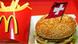 Big Mac with a Swiss flag stuck in it Big Mac with a Swiss flag stuck in it