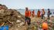 Trabajadores de Obras Públicas de República Dominicana limpian la playa de Güibia de plásticos. Trabajadores de Obras Públicas de República Dominicana limpian la playa de Güibia de plásticos.