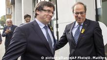 Former Catalan leader Carles Puigdemont, left, and current regional president of Catalonia Quim Torra prior to a meeting with government ministers and ministers in exile at the Government Delegation of Catalonia to the European Union in Brussels on Saturday, July 28, 2018. (AP Photo/Olivier Matthys) |