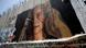 An artist paints on the Israeli wall a mural depicting Palestinian teen Ahed Tamimi An artist paints on the Israeli wall a mural depicting Palestinian teen Ahed Tamimi