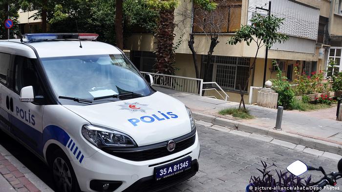 Turkish police secure the street in Izmir where Brunson now lives under house arrest.