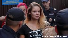 Intruders affiliated to anti-Kremlin punk band Pussy Riot, Veronika Nikulshina and Olga Kurachyova, who ran onto the pitch during the World Cup final between France and Croatia, walk out of a detention center after leaving 15-day jail in Moscow, Russia July 30, 2018. The t-shirt reads: Without love nothing will work out. REUTERS/Maxim Shemetov