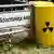 Yellow containers with nuclear sign