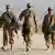 Drei US-Soldaten in Afghanistan auf Patrouille (Foto: Reuters/O. Sobhani)