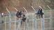 African migrants climb the border from morocco to Spain's North African enclave of Ceuta, Spain African migrants climb the border from morocco to Spain's North African enclave of Ceuta, Spain