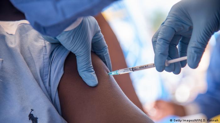 A person getting a vaccine against Ebola 