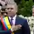 Colombia's new President Ivan Duque salutes to the audience after receiving the presidential sash from President of the Senate Ernesto Macias, during his inauguration ceremony at the Bolivar Square, in Bogota