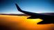 Symbolbild Flugzeug Sonnenuntergang Symbolbild Flugzeug Sonnenuntergang