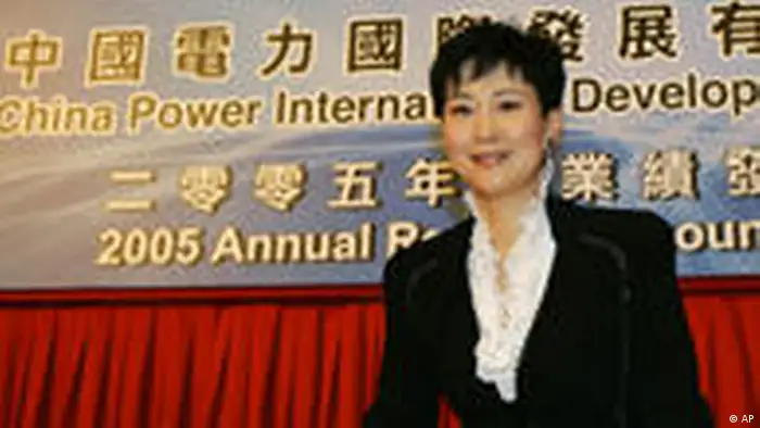 Li Xiaolin, the Vice Chairman and Chief Executive Officer of China Power attends the news conference of China Power International Development Limited Annual Results announcement in Hong Kong Friday, March 17, 2006. (AP Photo/Kin Cheung)