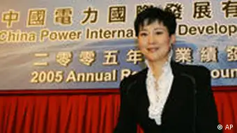 Li Xiaolin, the Vice Chairman and Chief Executive Officer of China Power attends the news conference of China Power International Development Limited Annual Results announcement in Hong Kong Friday, March 17, 2006. (AP Photo/Kin Cheung)