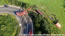 Drone photo of Firefighters who remove the wreck at the scene of accident on the national road No. 28 in Leszczawa, Poland, 18 August 2018. Three people died in the night of 17 to 18 August 2018 when a Ukrainian bus fell from the high embankment. EPA/DAREK DELMANOWICZ POLAND OUT |