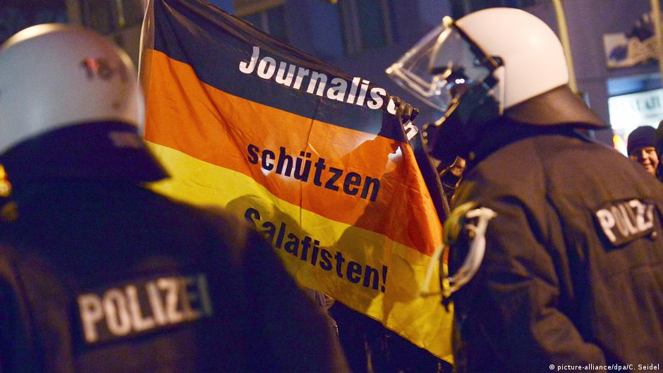 PEGIDA man in reporter row was police employee